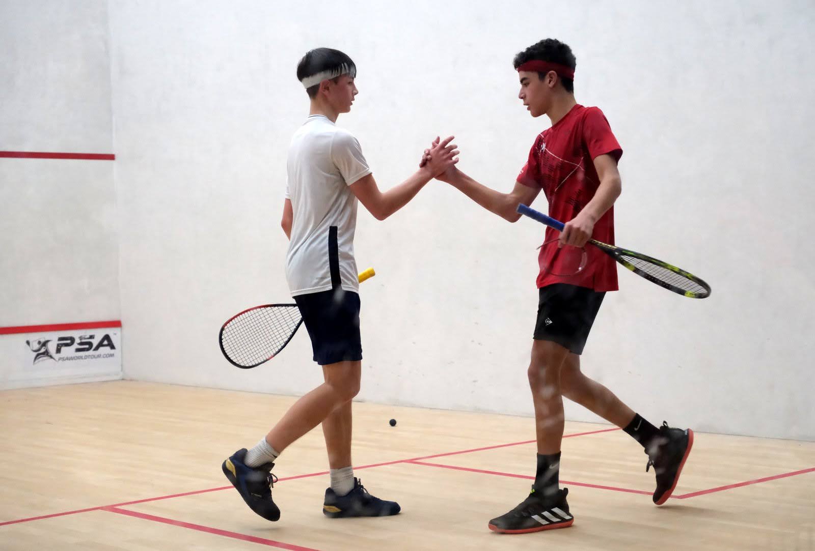 Two Boys Shaking Hands After A Squash Match